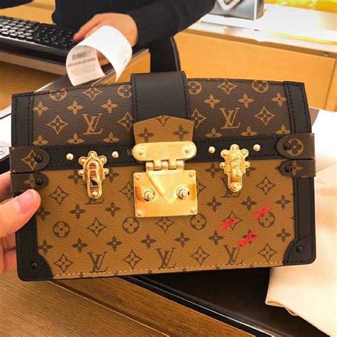 lv clutch women's|louis vuitton women's clutch.